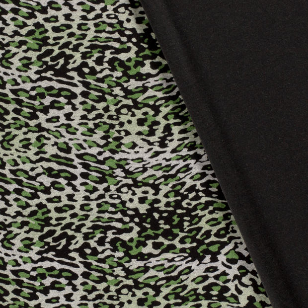 Poly Viscose Jersey fabric Panther discharge printed 